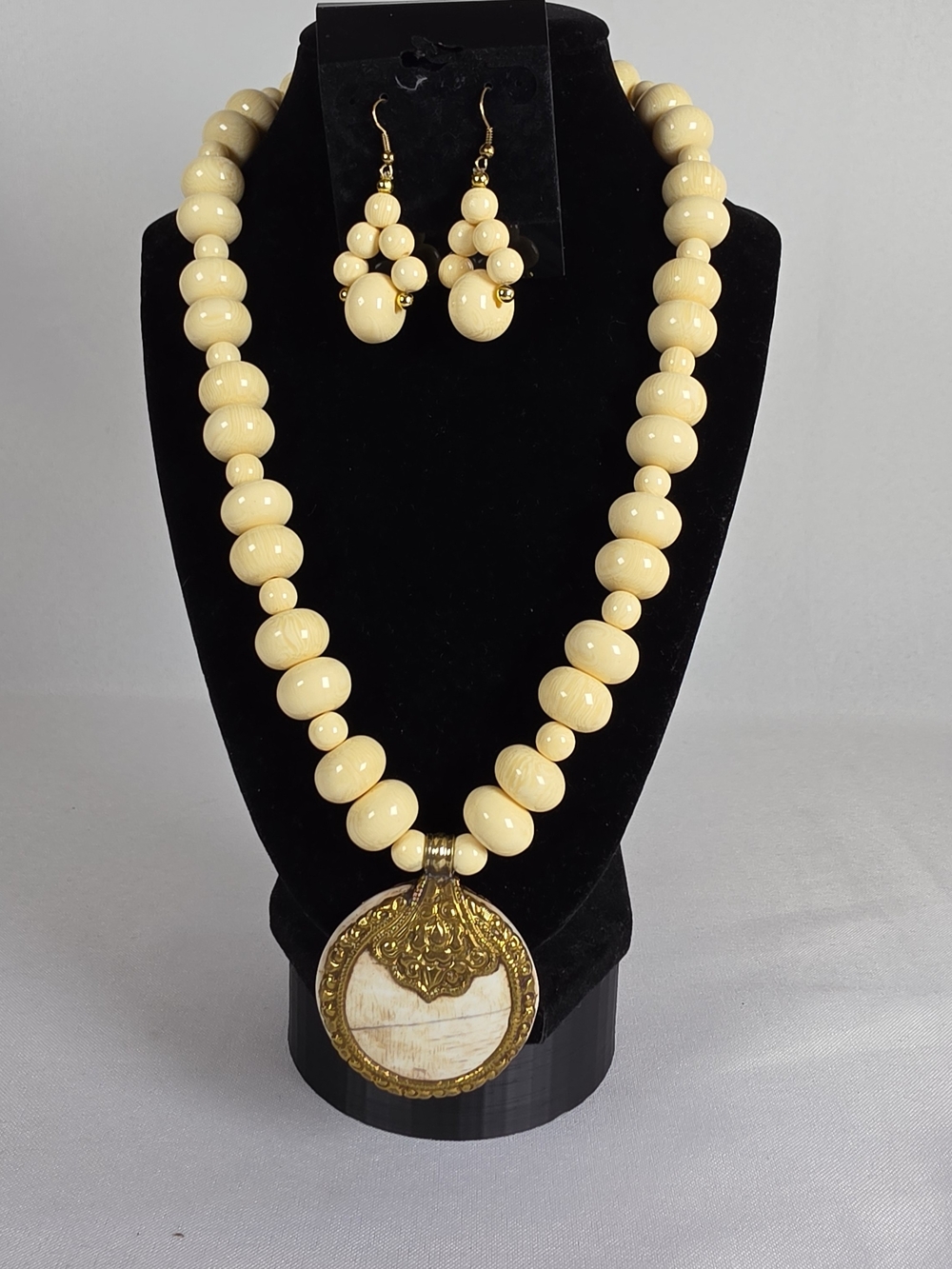 Beige Beaded Necklace and Earrings Set with Ornate Gold Pendant